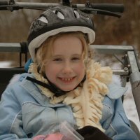 Smiles before a dryland dog sledding run.