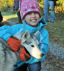 A Girl Scout gets a kiss from Acadia