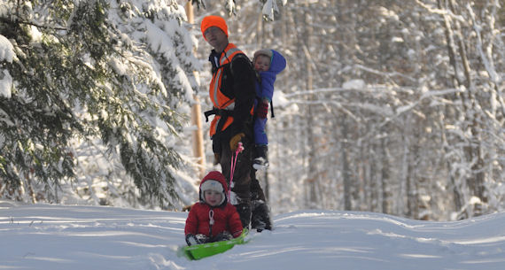 Eric, Ethan and Eloise out in the snow near Starks, Maine.